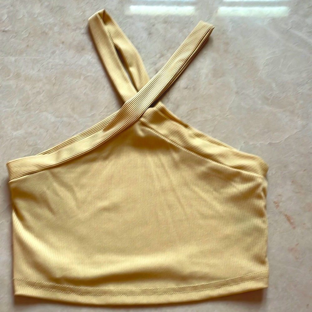 Yellow V-neck crop top.